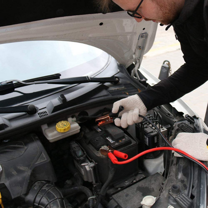 Emergency Roadside Assistance Safety Kit - First Aid Kit, Jumper Cables, LED Warning Light, Work Gloves, Tools and More