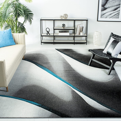 Safavieh Hollywood Collection HLW712F Mid-Century Modern Non-Shedding Stain Resistant Living Room Bedroom Area Rug, 2'7" x 5', Grey / Blue